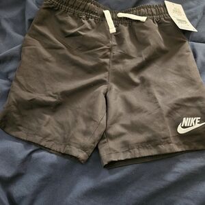 Nike Black Athletic Shorts with White Logo and Drawstring